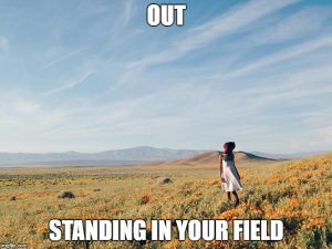 Picture of someone standing in a field. 